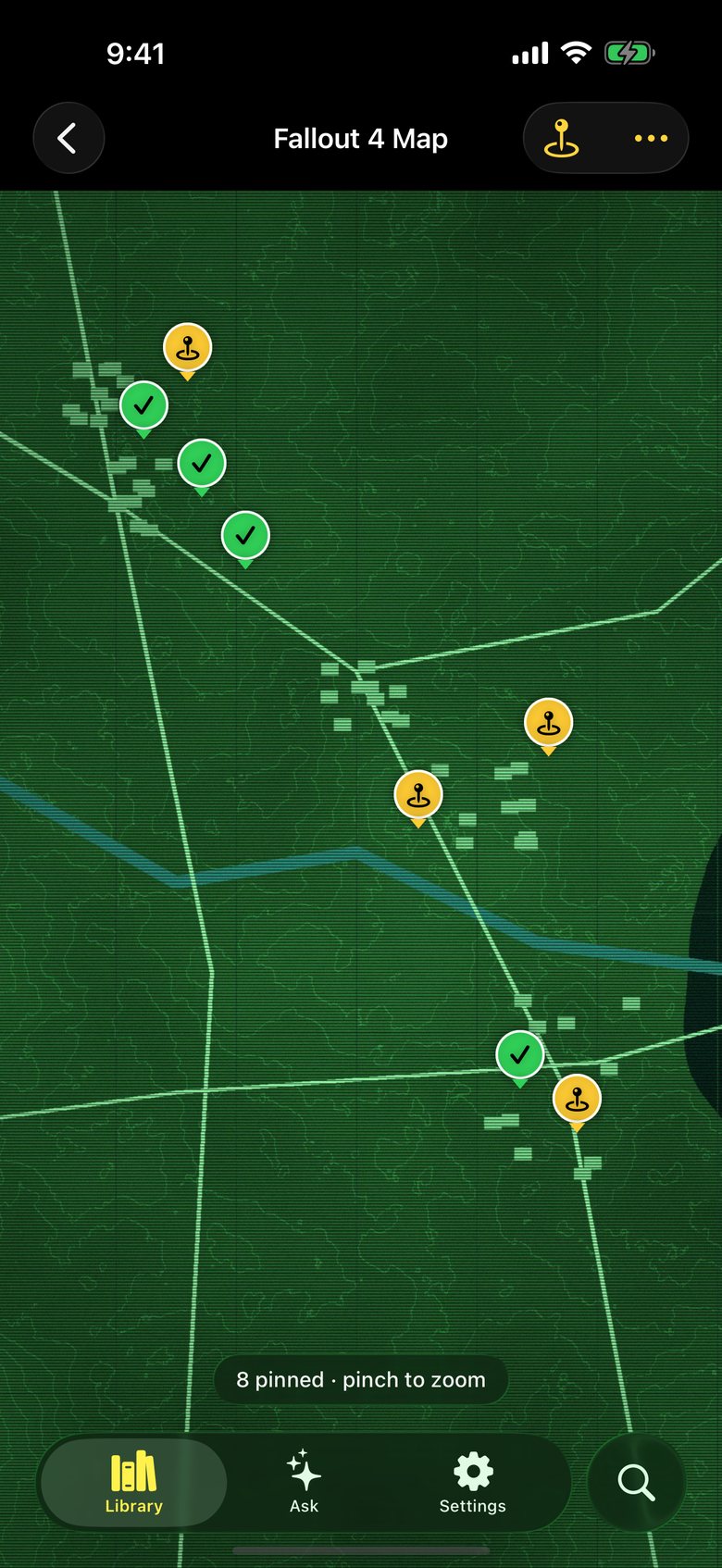 A map screenshot with pins for logged locations, cleared ones marked with a check